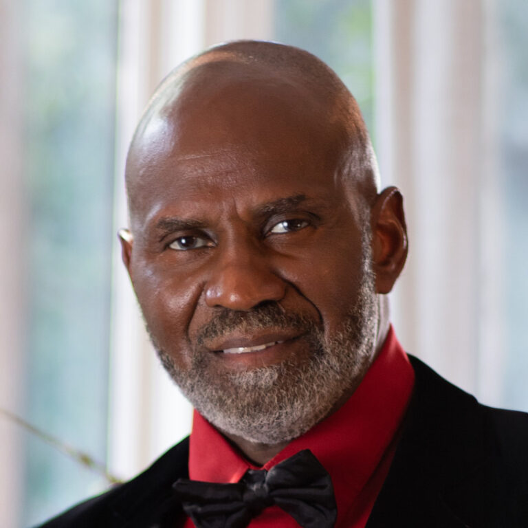 Headshot of Juliu Tennon